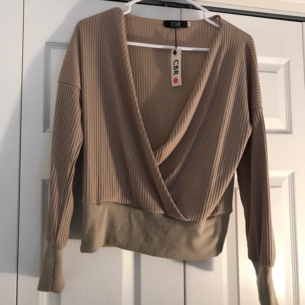 Brown V-neck sweater